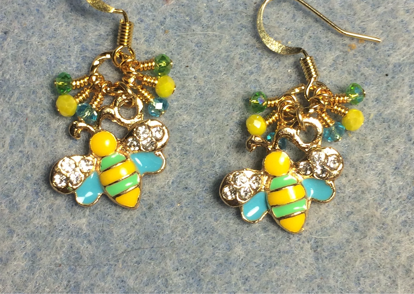 Yellow, green, and aqua enamel and rhinestone honeybee charm earrings adorned with tiny dangling yellow, green, and aqua Chinese crystal beads.