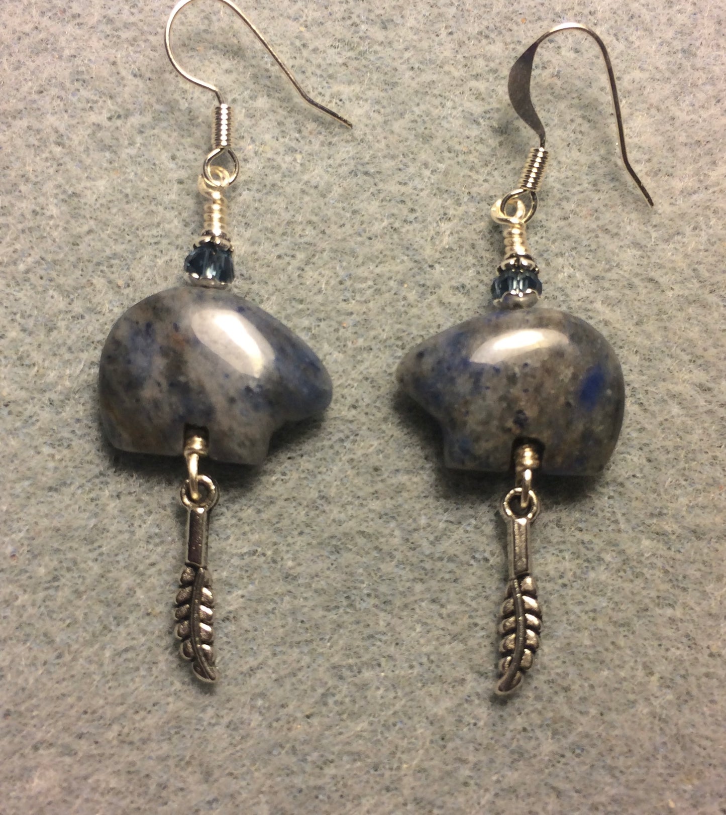 Blue sodalite gemstone Zuni bear fetish bear earrings adorned with blue crystal beads and tiny silver feather charms.