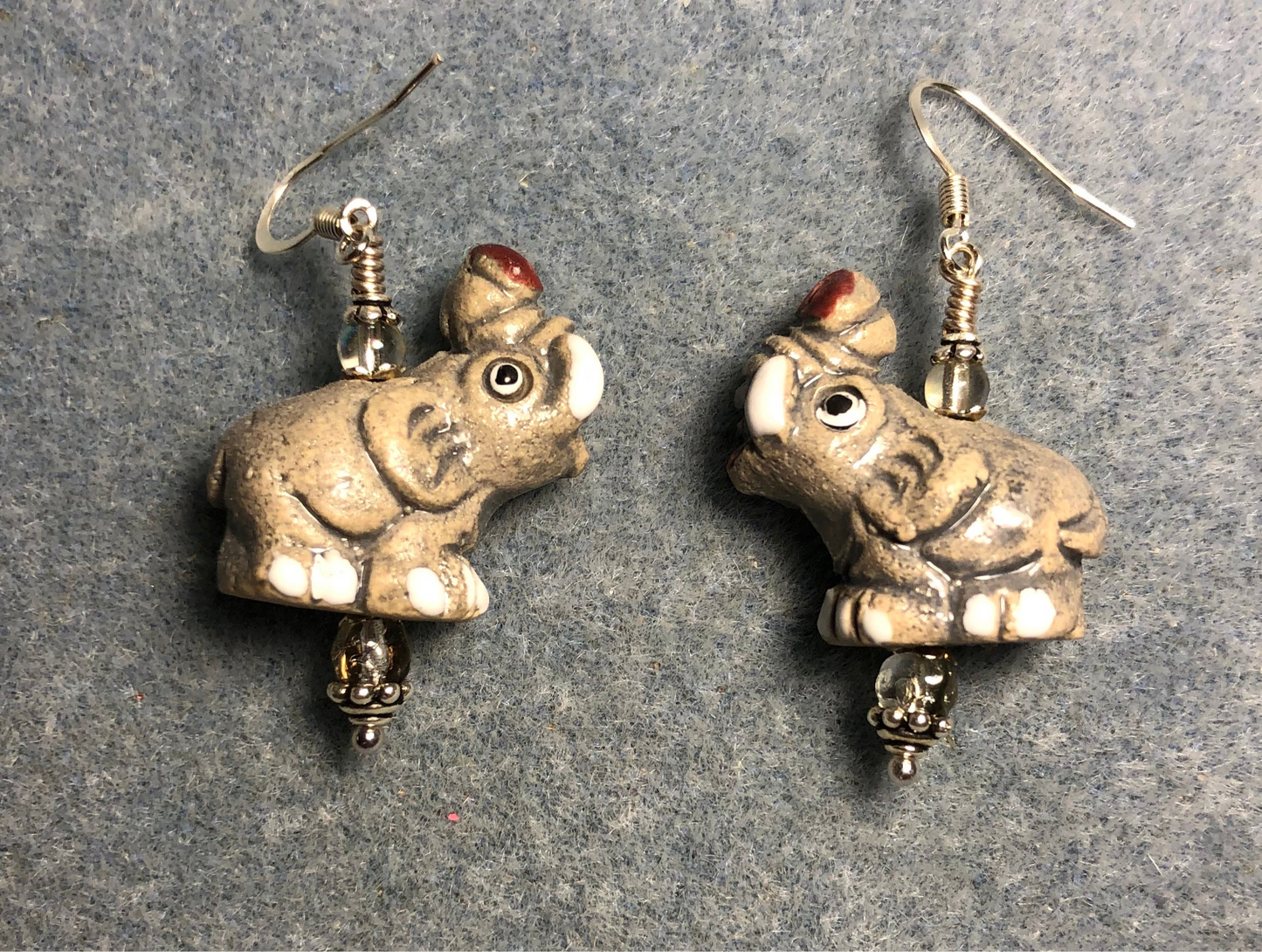 Gray and white ceramic elephant bead earrings adorned with gray Czech glass beads.