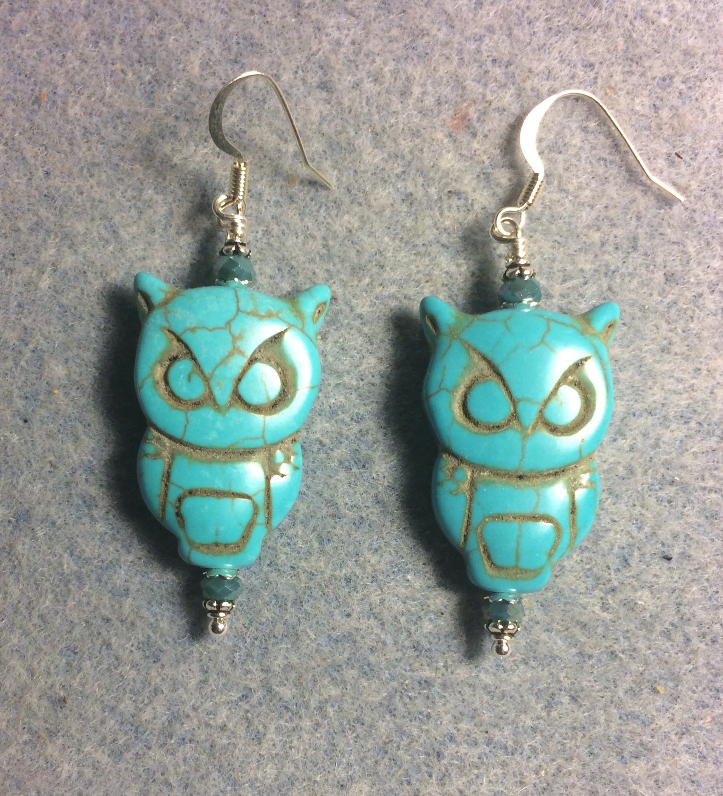 Large howlite gemstone owl bead earrings adorned with turquoise Chinese crystal beads.