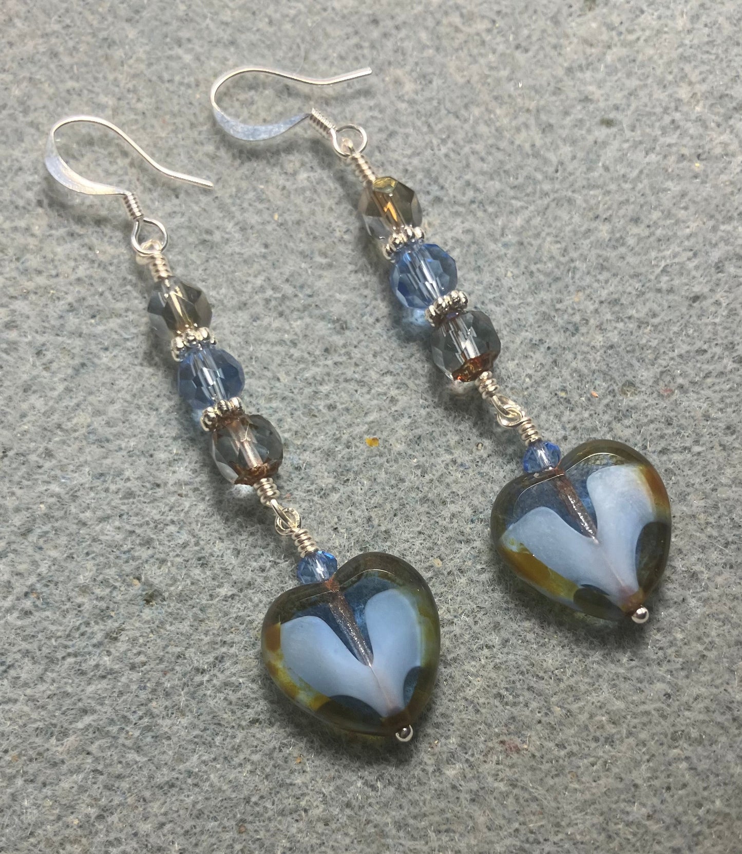 Montana blue Czech glass heart bead earrings adorned with Montana blue and light blue Czech glass beads.