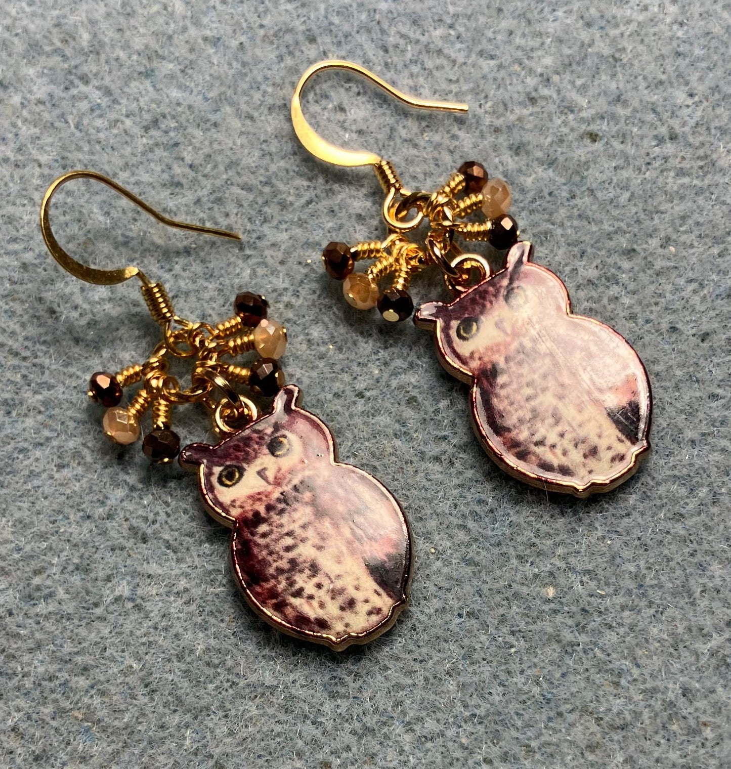 Brown, amber, and black enamel owl charm earrings adorned with tiny dangling brown, amber, and black Chinese crystal beads.