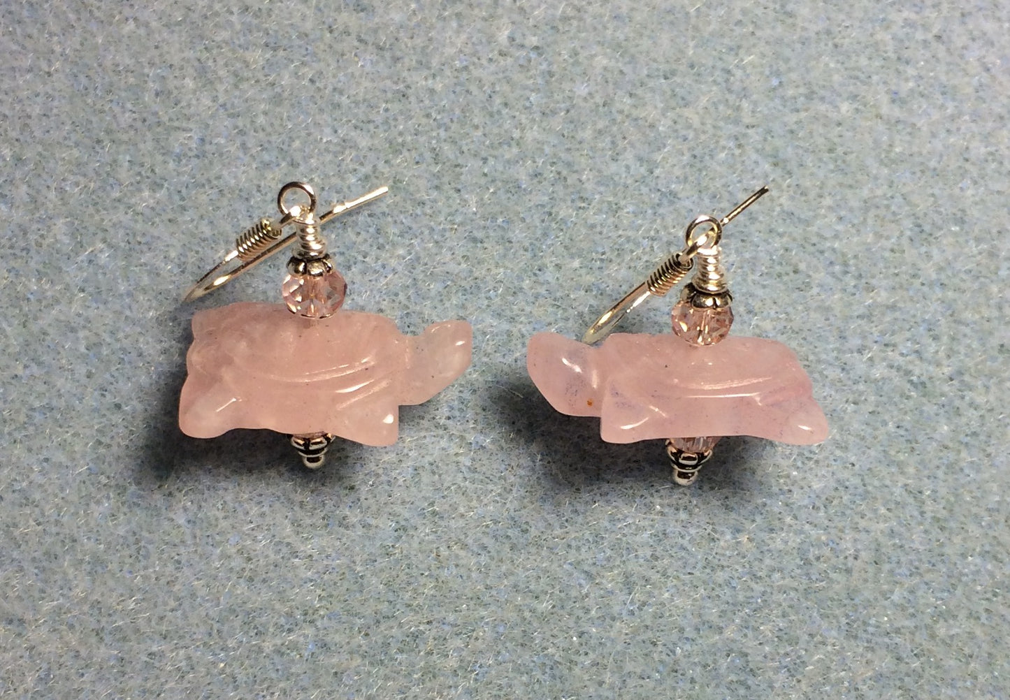 Pink rose quartz gemstone turtle bead earrings adorned with pink Chinese crystal beads.