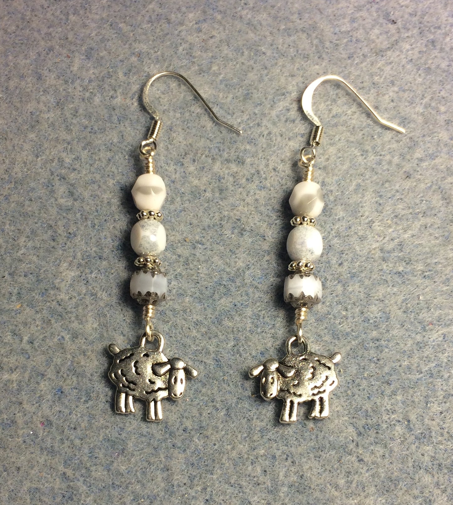Silver sheep charm earrings adorned with gray and white Czech glass beads