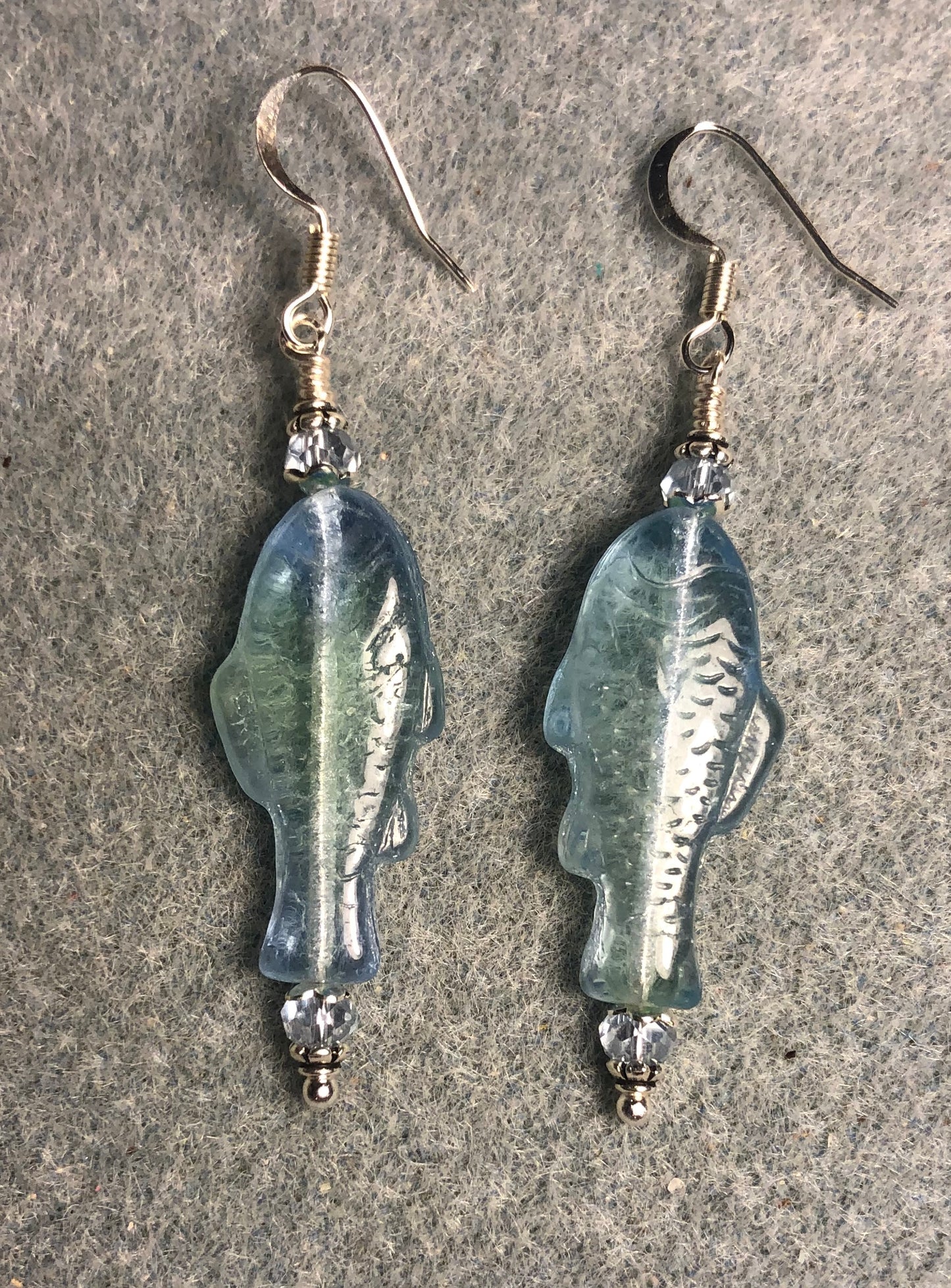 Light blue and yellow Czech glass fish bead earrings adorned with light blue Chinese crystal beads.