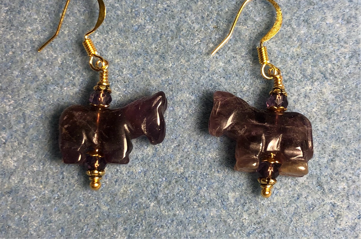 Genuine amethyst gemstone horse bead earrings adorned with purple Chinese crystal beads.