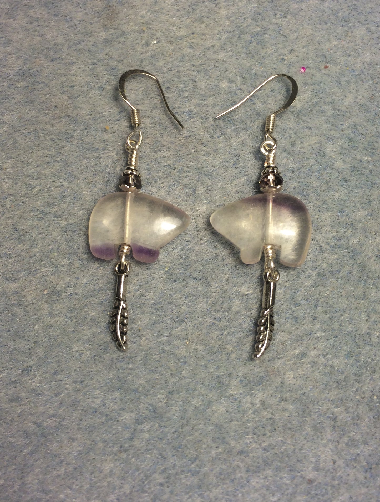 Clear purple fluorite gemstone Zuni bear fetish bead earrings adorned with purple crystal beads and tiny silver feather charms.