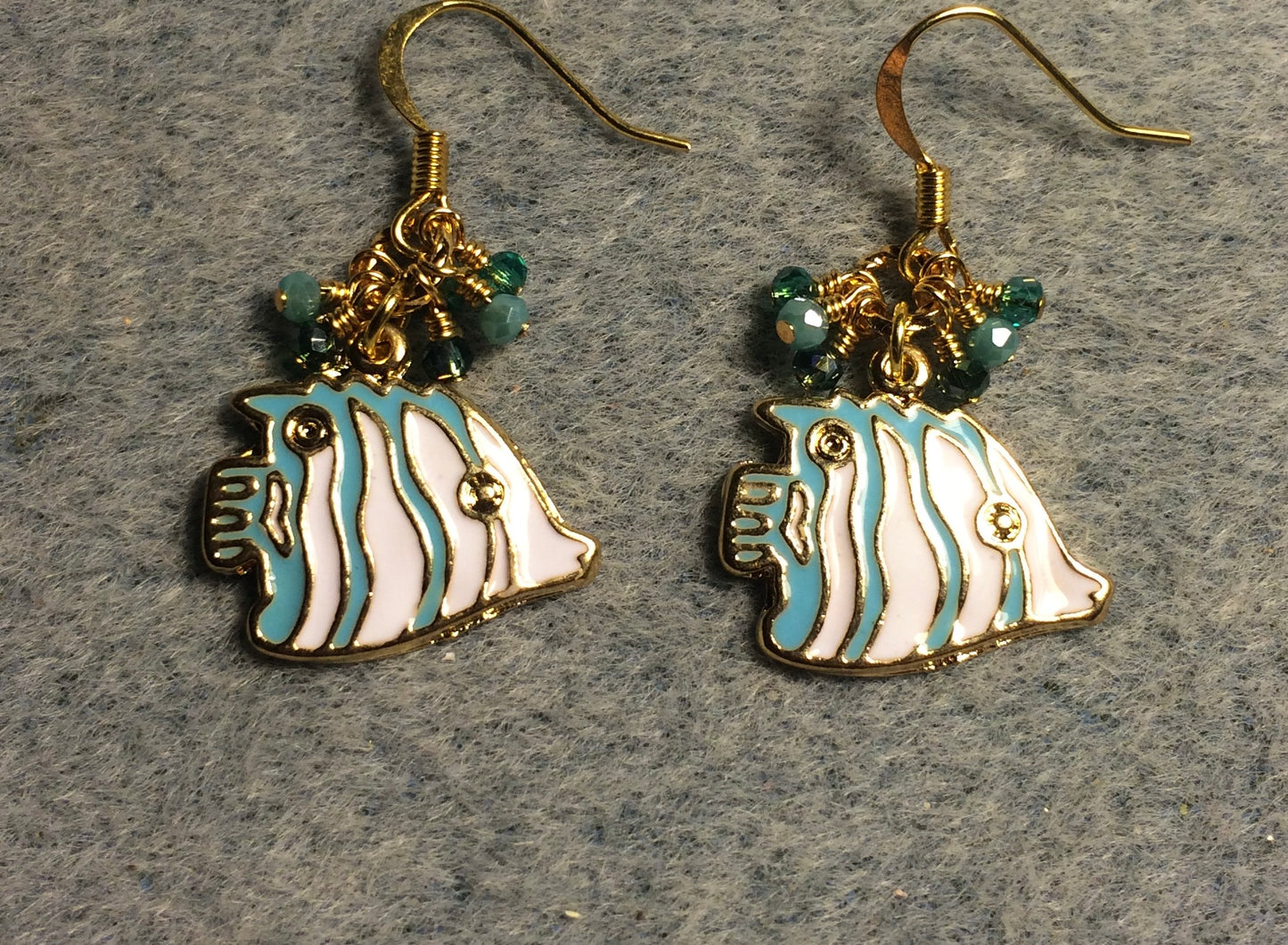 Turquoise and white enamel striped angelfish charm earrings adorned with tiny dangling turquoise Chinese crystal beads.