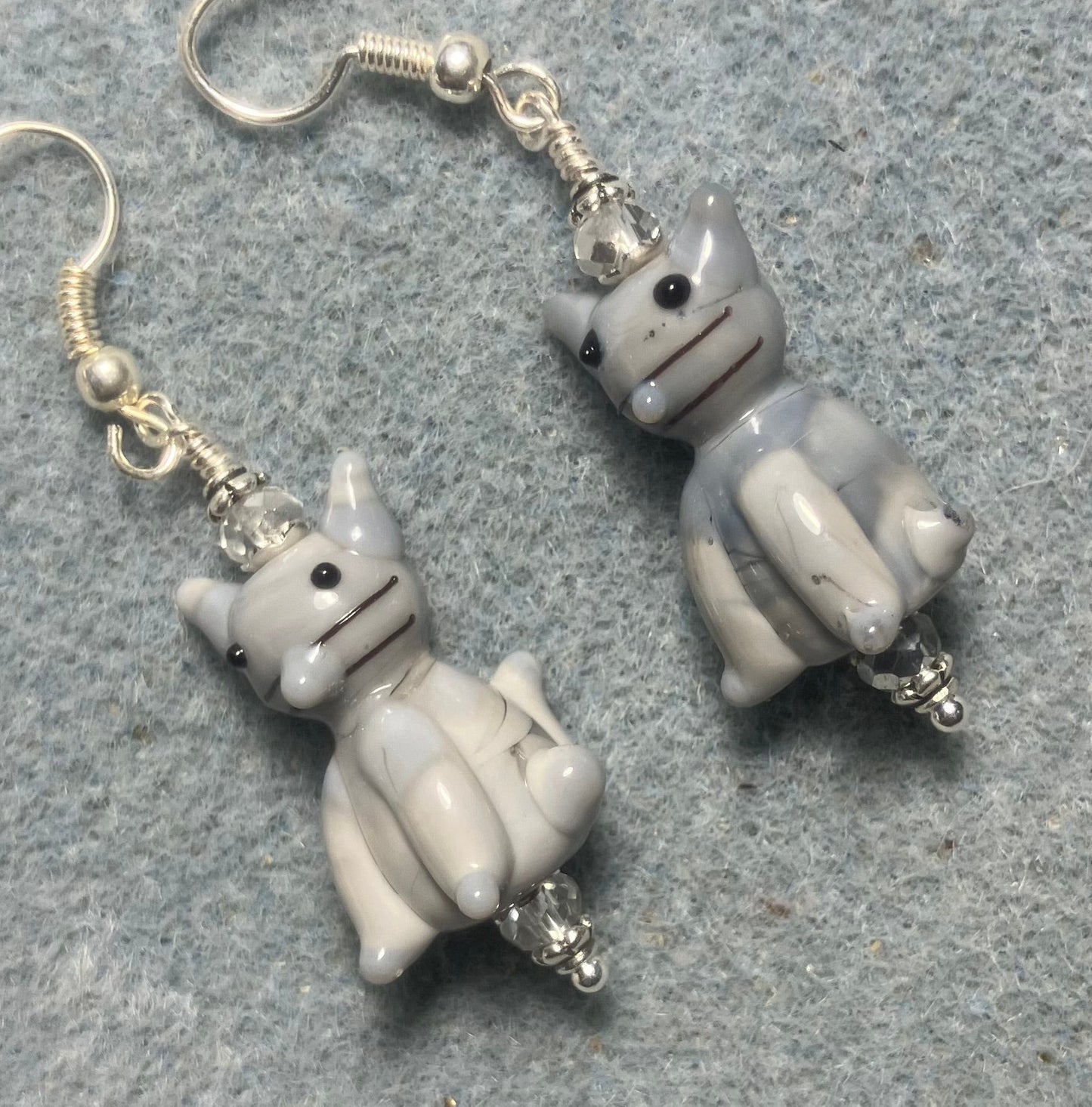 Opaque gray lamp cat bead earrings adorned with clear Chinese crystal beads.