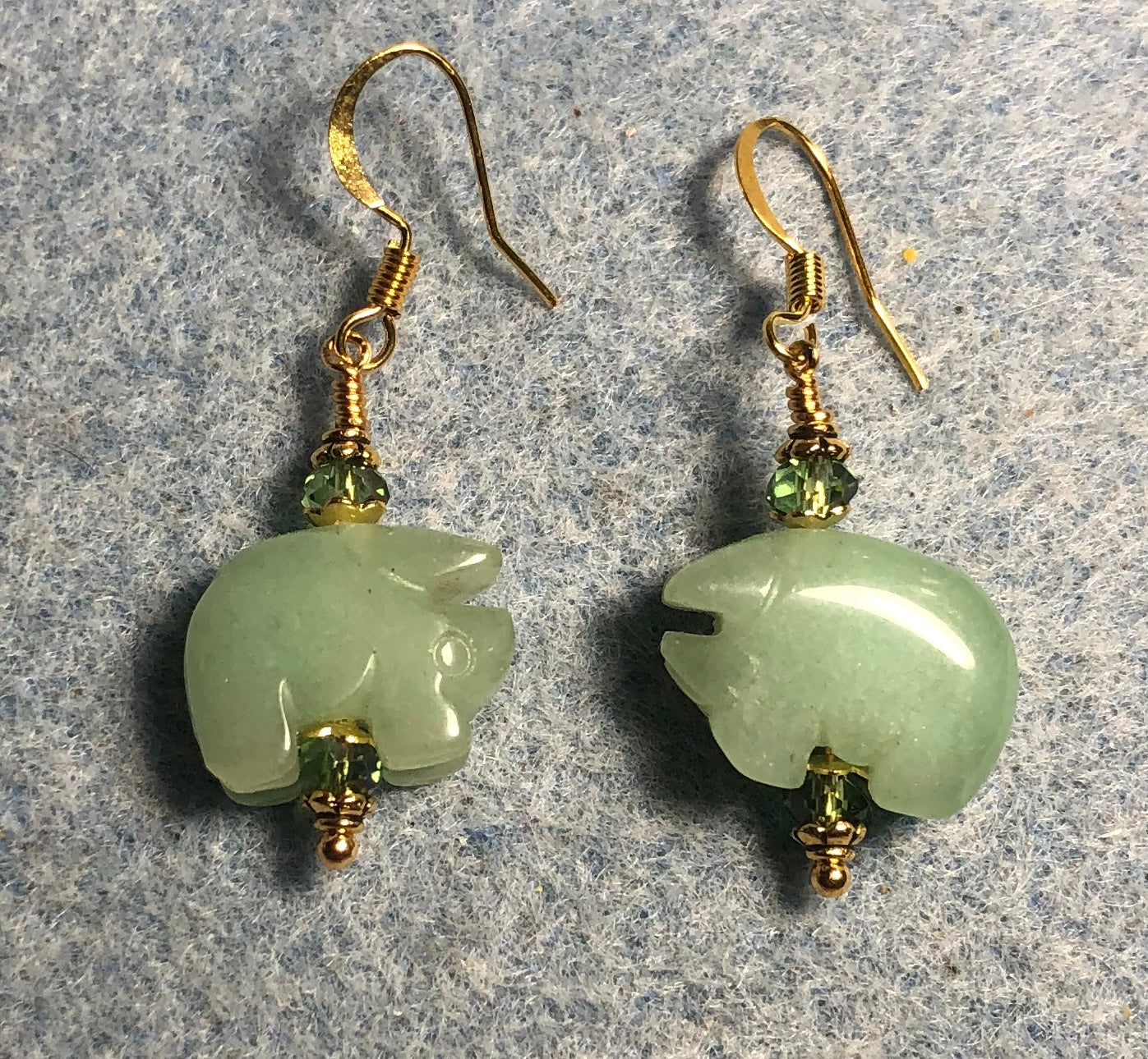 Small green aventurine gemstone pig bead earrings adorned with sparkly green Chinese crystal beads.