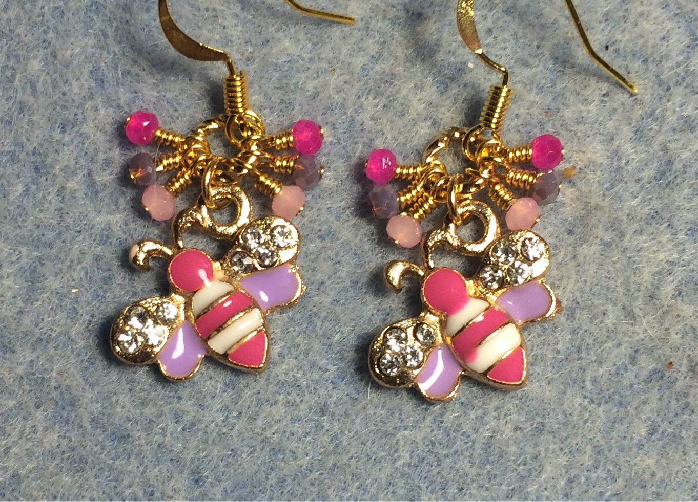 Hot pink, lavender, and light pink enamel and rhinestone honeybee charm earrings adorned with tiny dangling hot pink, lavender, and light pink Chinese crystal beads.