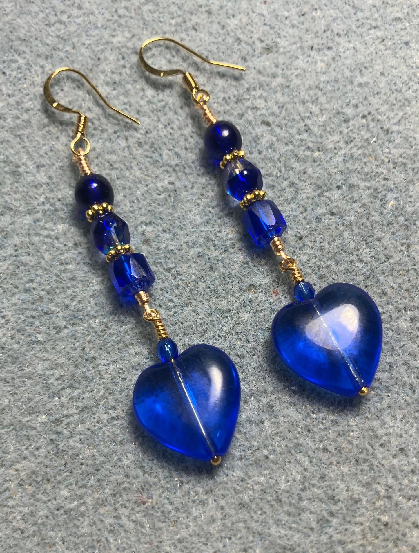 Cobalt blue Czech glass heart bead earrings adorned with cobalt blue Czech glass beads.