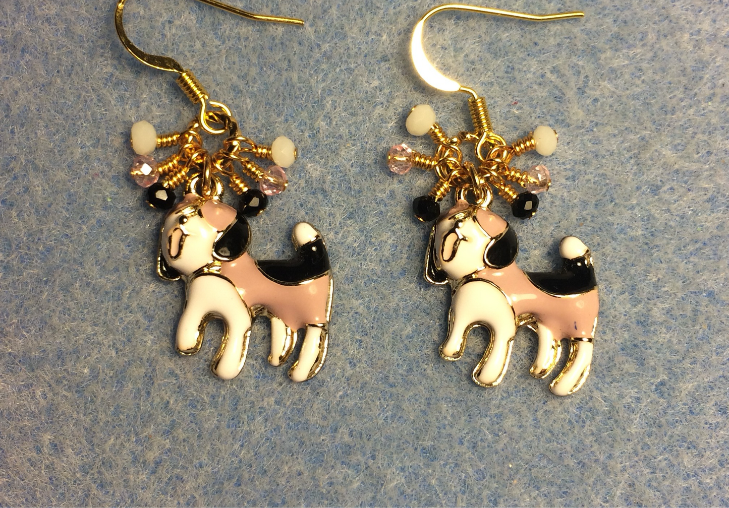Pink, black, and white enamel dog charm earrings adorned with tiny dangling pink, black, and white Chinese crystal beads.