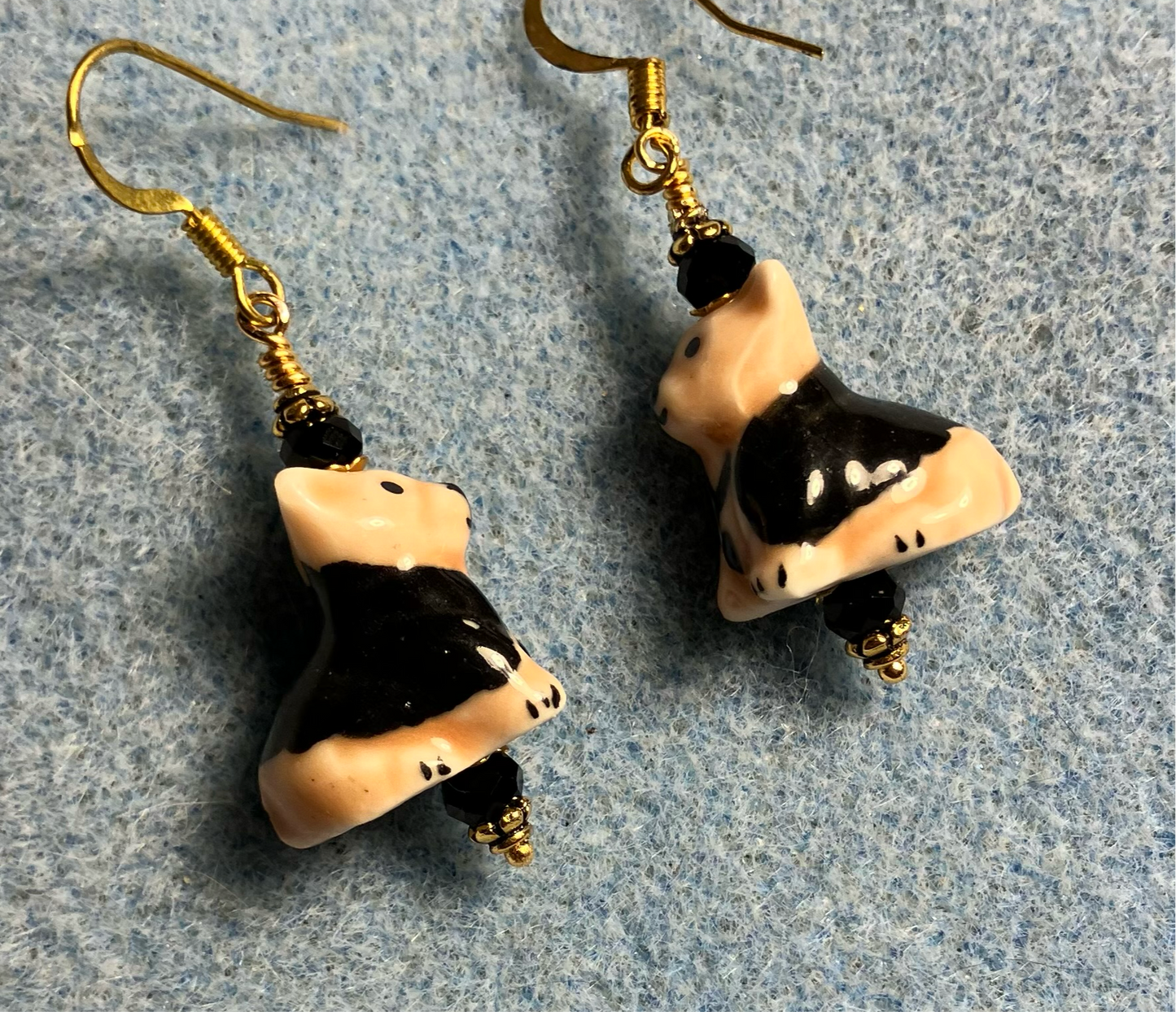 Tan and black ceramic puppy dog bead earrings adorned with black Chinese crystal beads.