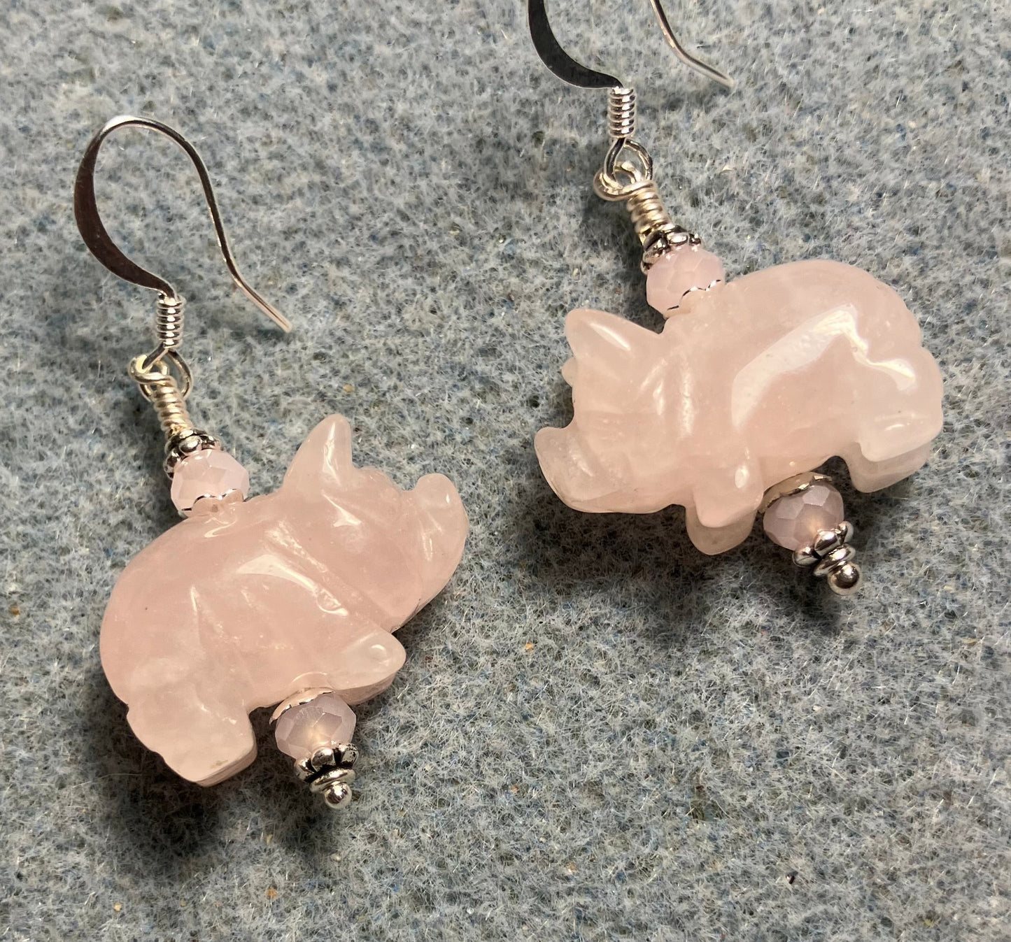 Pink rose quartz gemstone pig bead earrings adorned with pink Chinese crystal beads.
