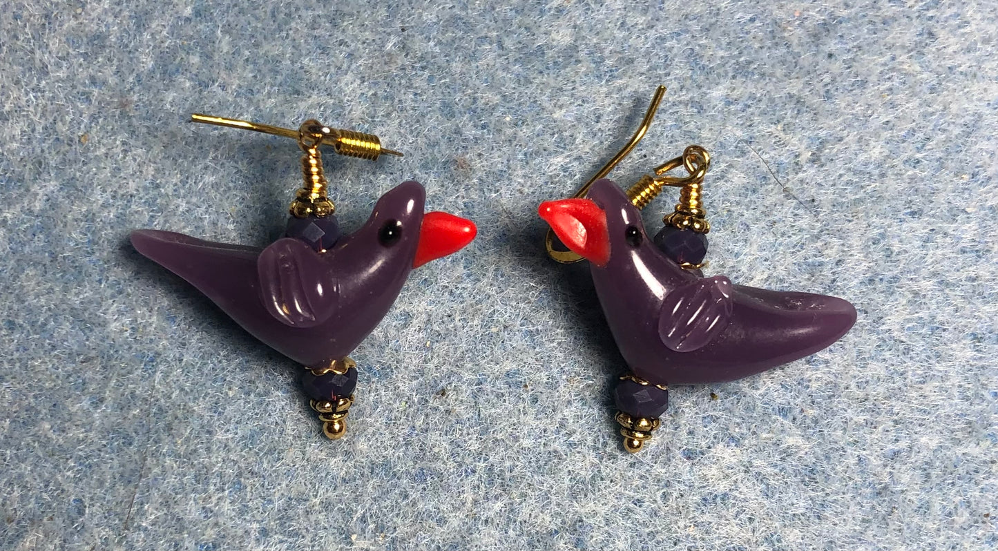 Opaque purple lamp work songbird bead earrings adorned with purple Chinese crystal beads.