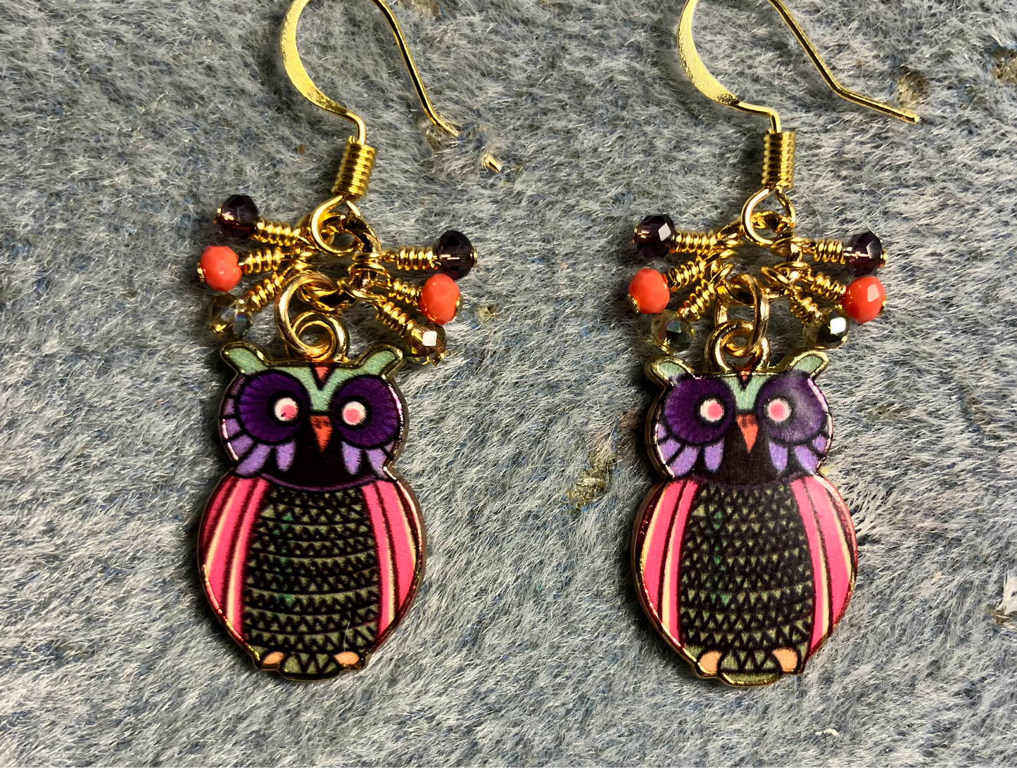 Purple, coral, and green enamel owl charm earrings adorned with tiny dangling purple, coral, and green Chinese crystal beads.