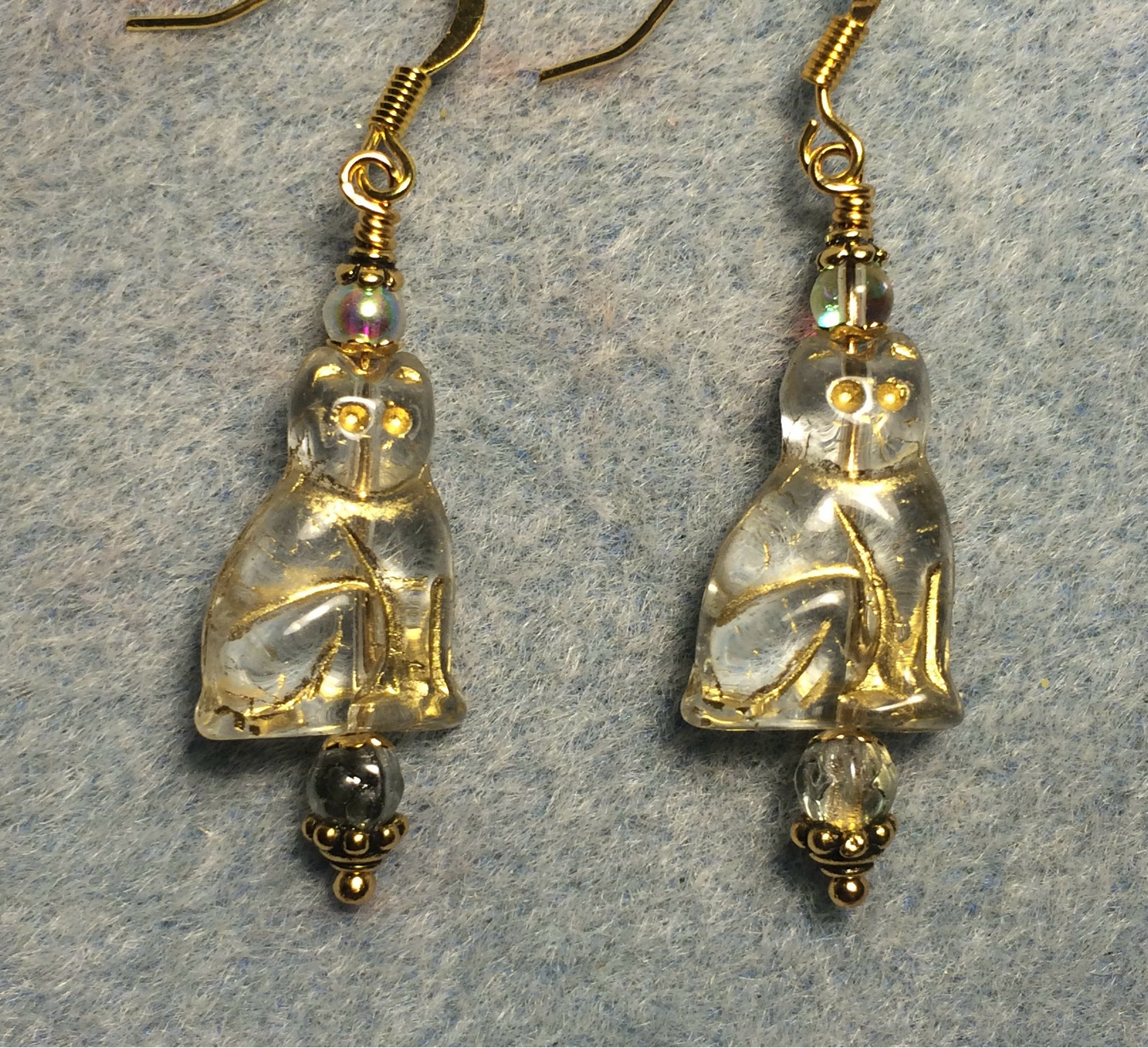 Clear (with gold inlay) Czech glass cat bead earrings adorned with clear Czech glass beads.