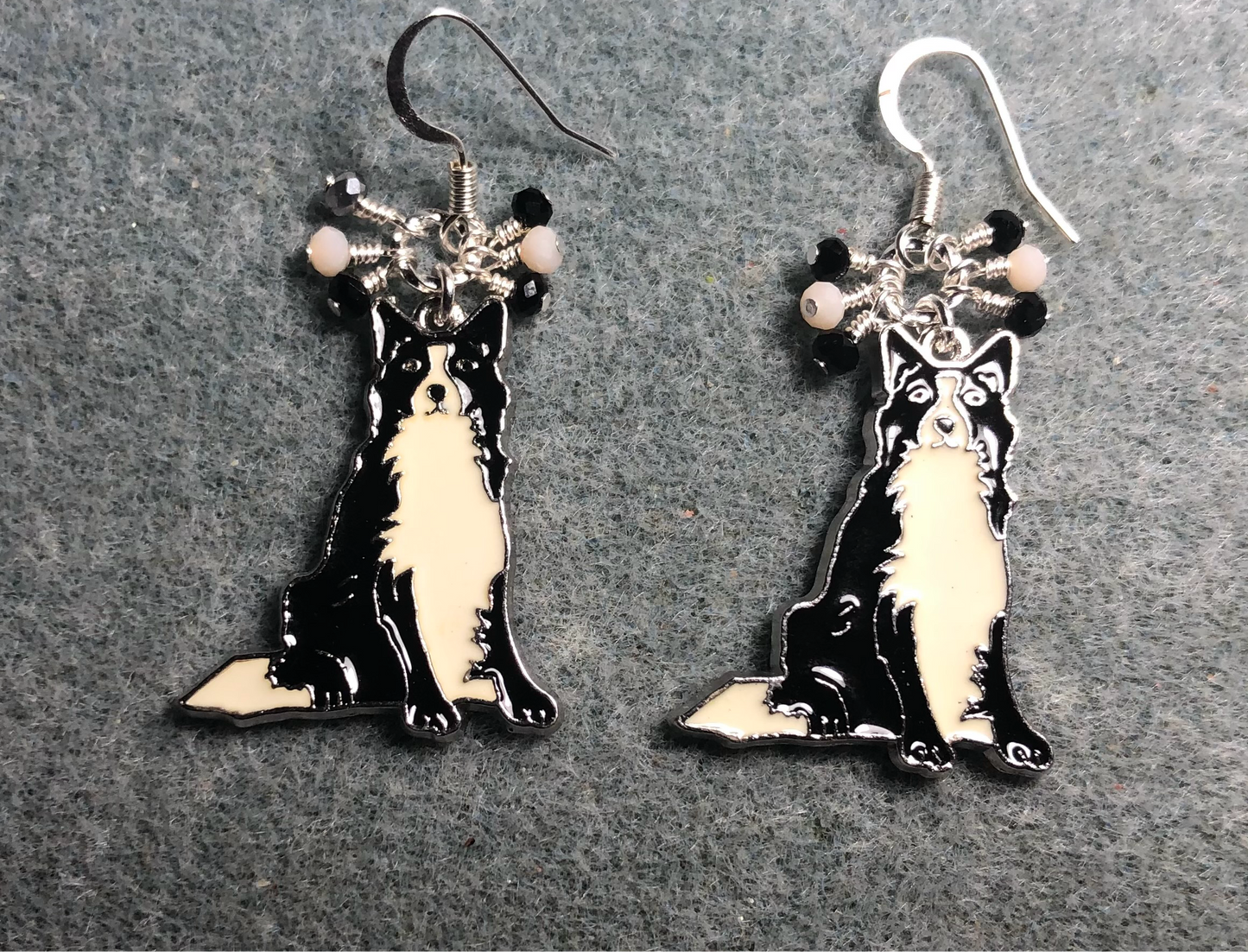 Black and white enamel Border Collie charm earrings adorned with tiny dangling black and white Chinese crystal beads.