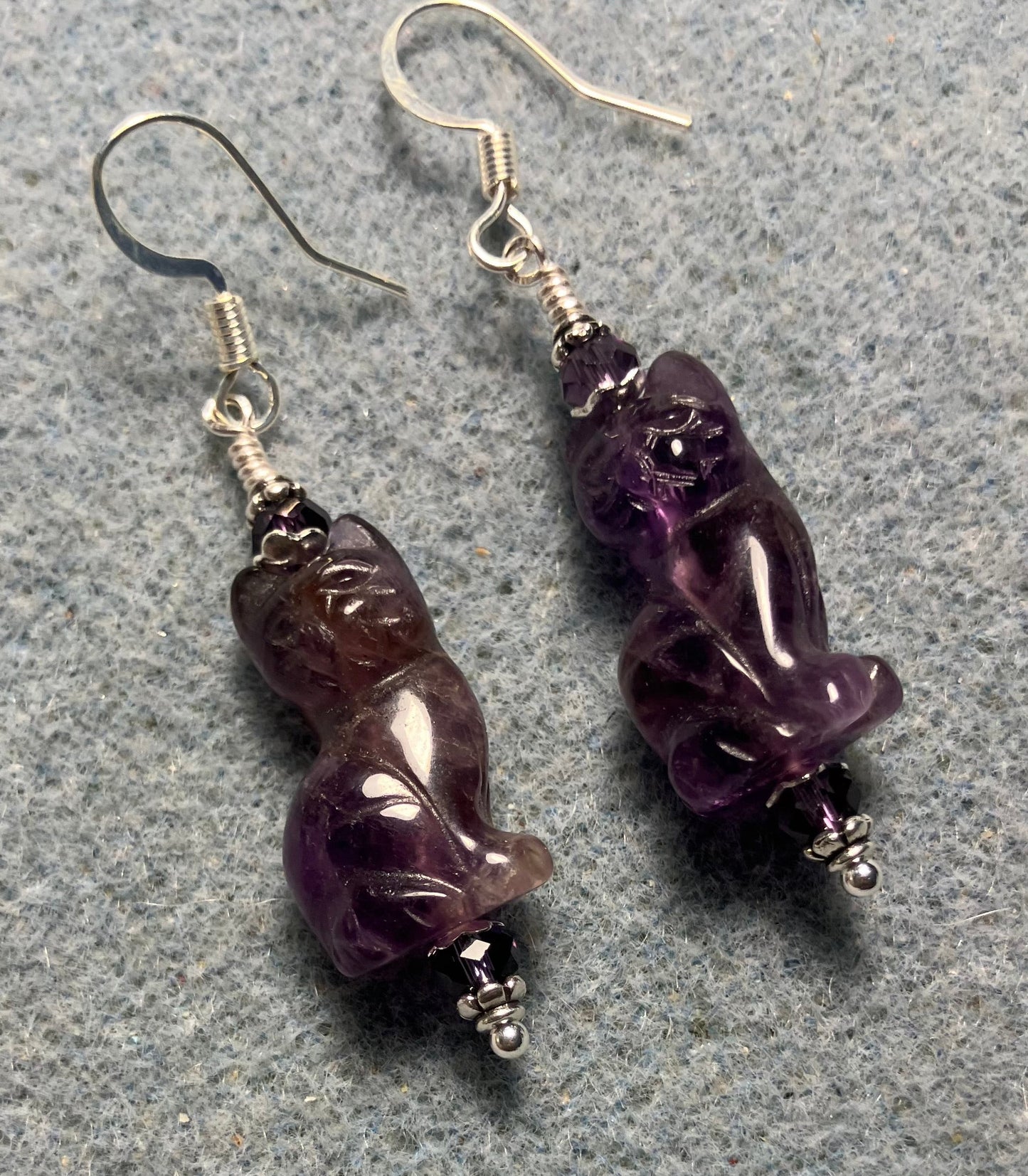 Genuine amethyst gemstone cat bead earrings adorned with purple Chinese crystal beads.