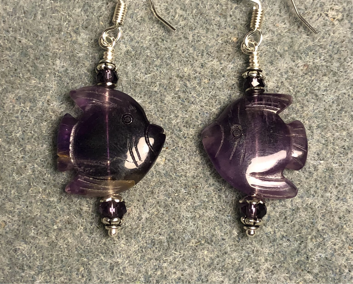 Genuine amethyst gemstone angelfish bead earrings adorned with purple Chinese crystal beads.