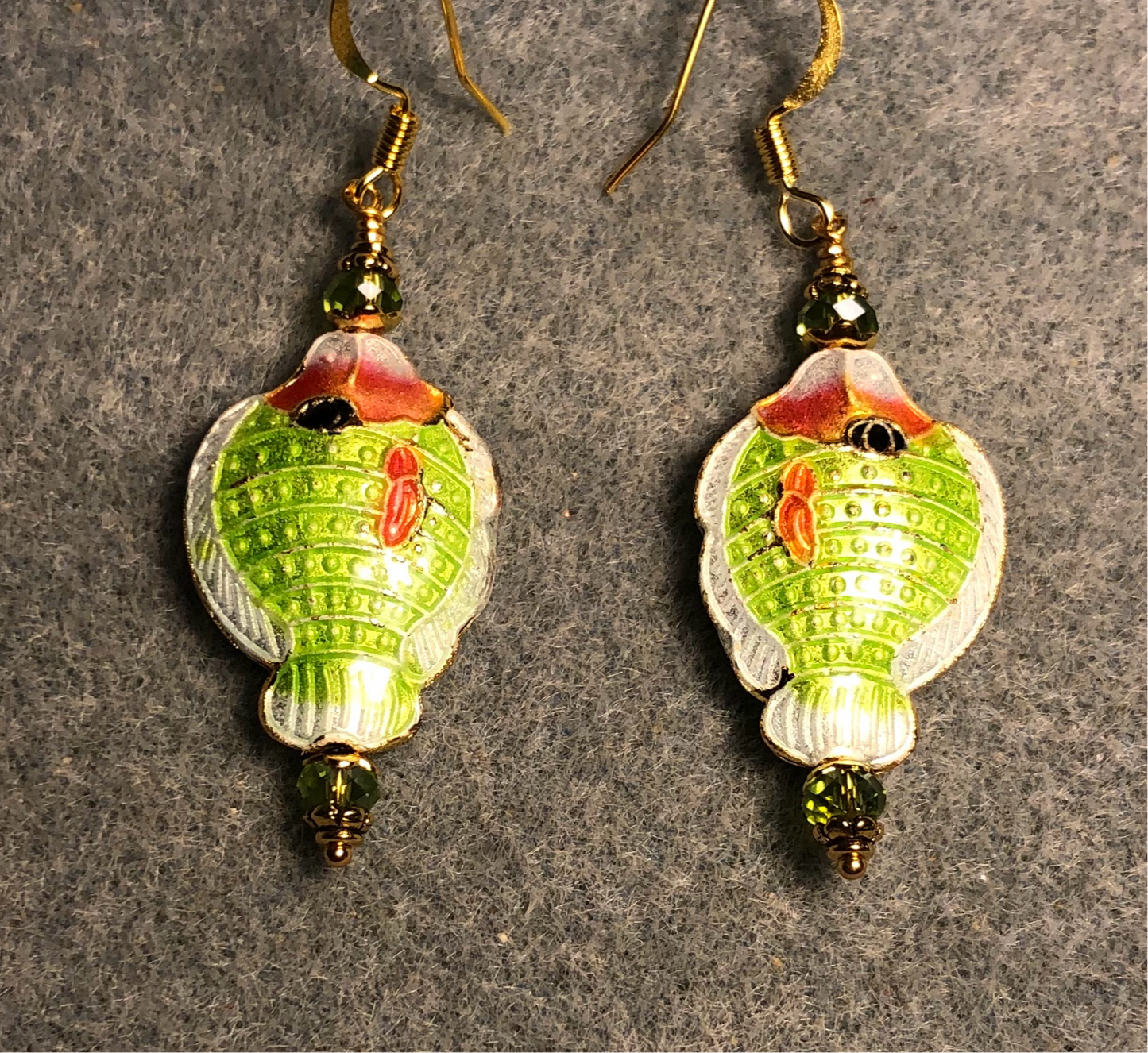 Olive green and peach cloisonné fish bead earrings adorned with olive green Chinese crystal beads.