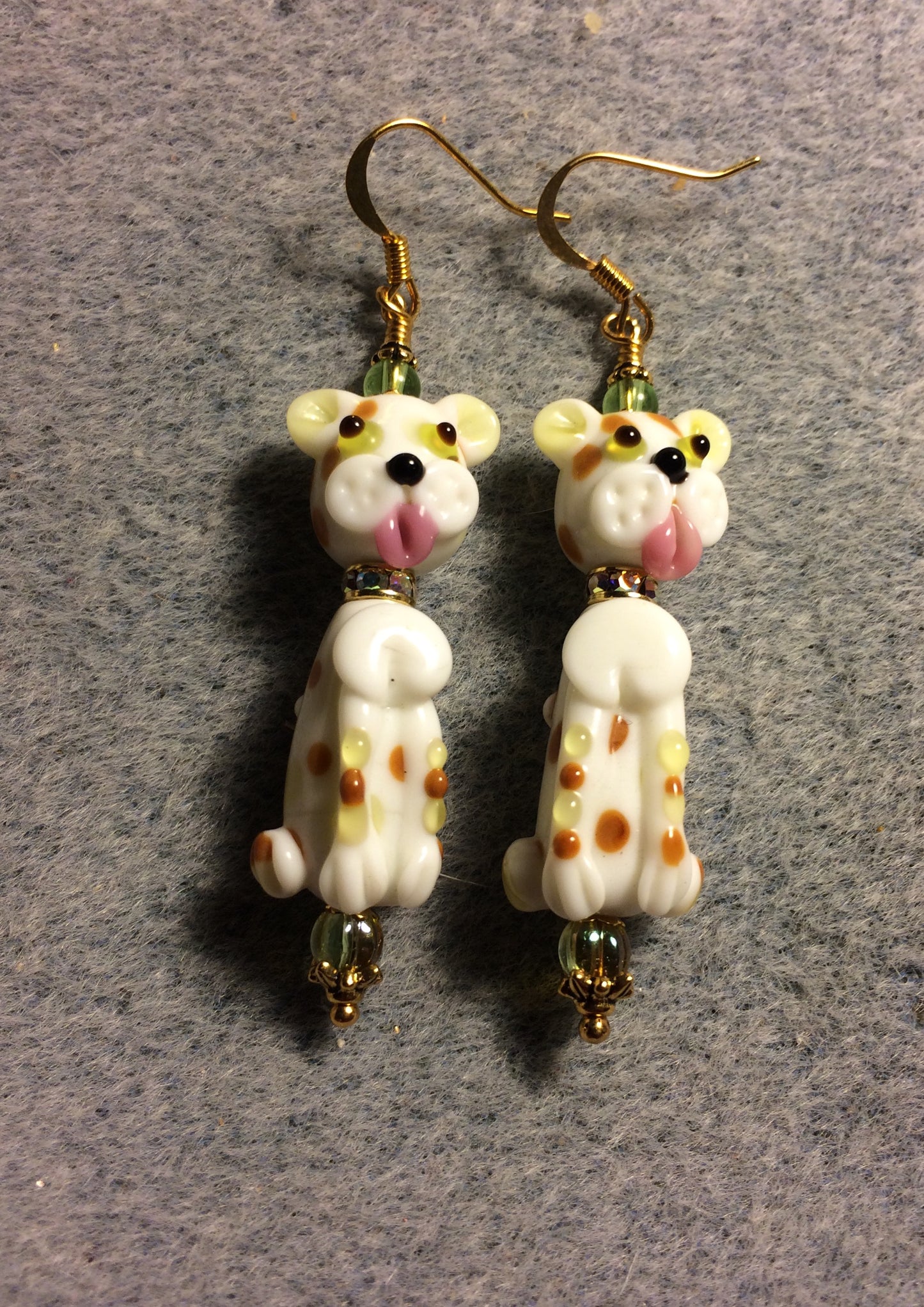 White, lime green, and tan lamp work puppy dog bead earrings adorned with clear rhinestone rondelle “collars” and lime green Czech glass beads.