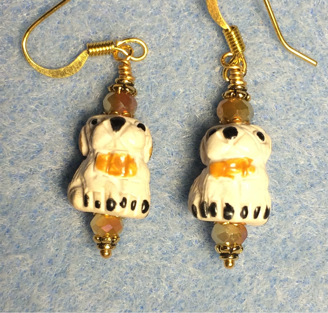 Small white and beige ceramic puppy dog bead earrings adorned with tan Chinese crystal beads.