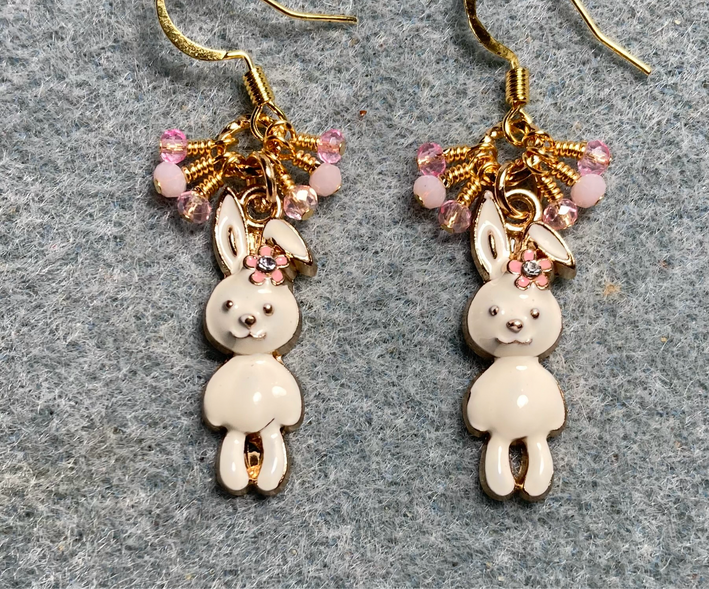 Pink enamel and rhinestone rabbit charm earrings adorned with pink Chinese crystal beads.