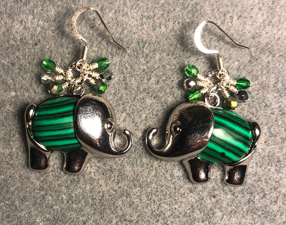 Large silver and green malachite gemstone elephant charm earrings adorned with small dangling green and silver Czech glass beads.