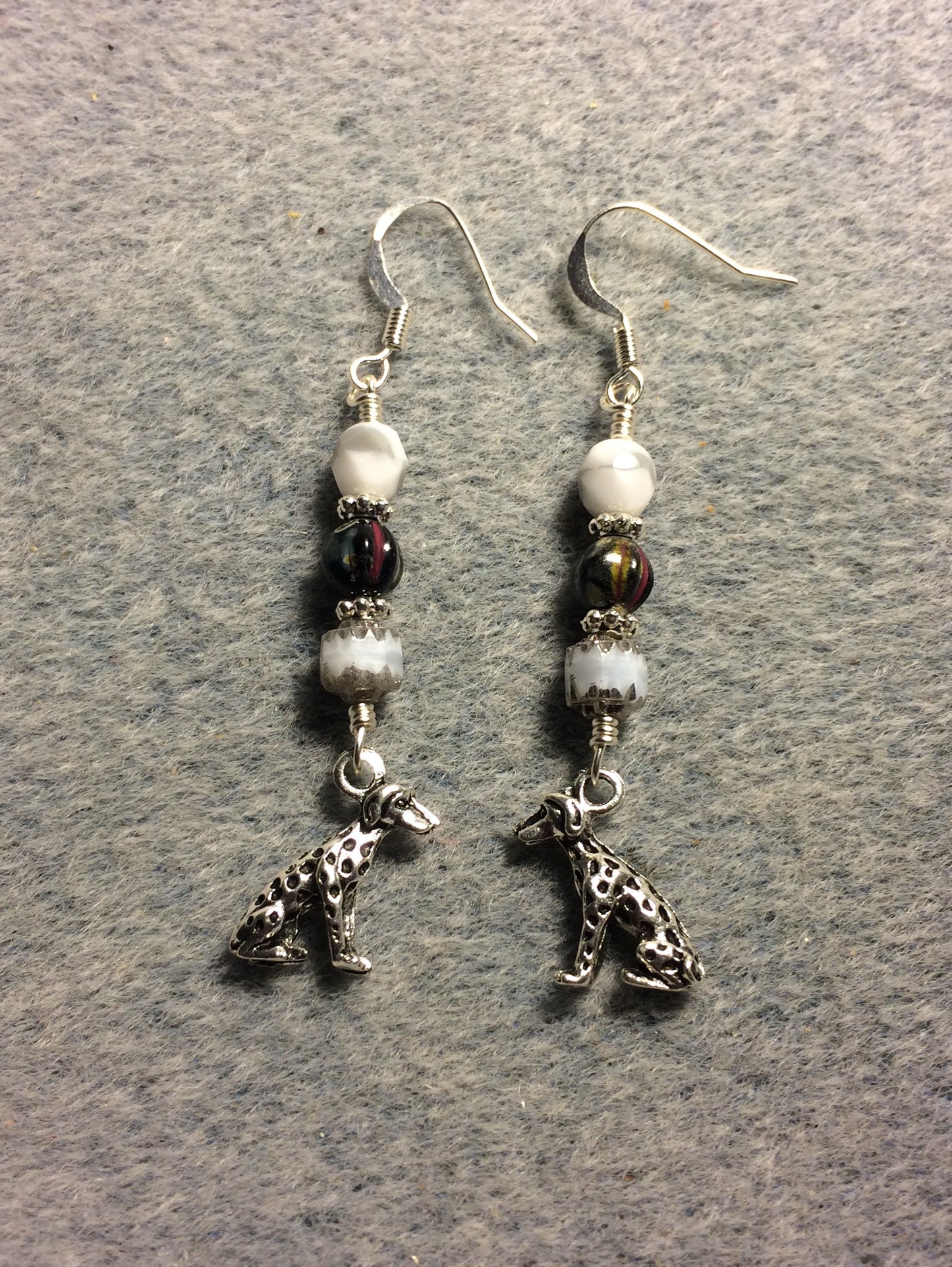 Silver Dalmatian charm earrings adorned with white and black Czech glass beads