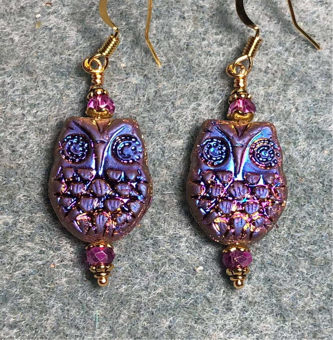 Iridescent pinkish purple Czech glass owl bead earrings adorned with metallic pink Chinese crystal beads.
