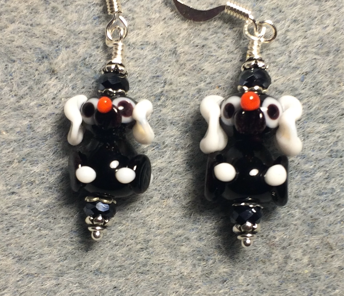 Small black and white lamp work puppy dog bead earrings adorned with black Chinese crystal beads.