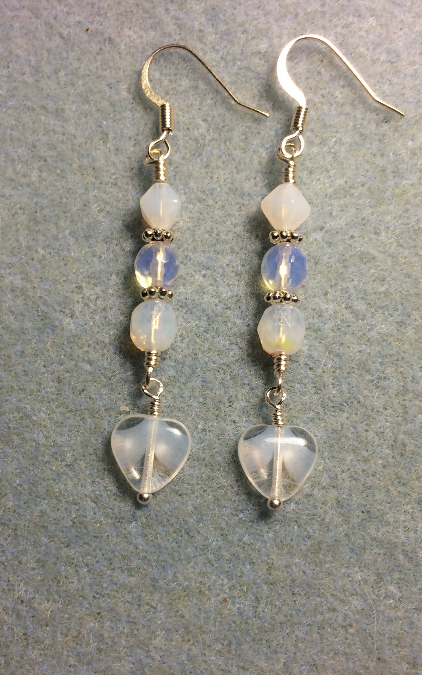 Small milky white and clear Czech glass heart bead earrings adorned with milky white and clear Czech glass beads.