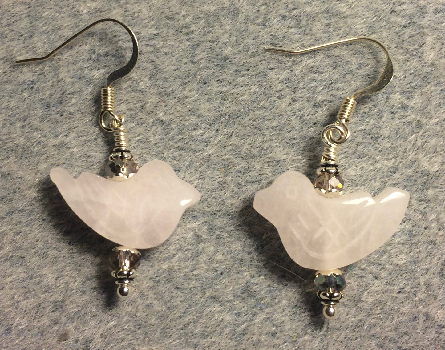Rose quartz gemstone bird bead earrings adorned with purplish pink Chinese crystal beads.