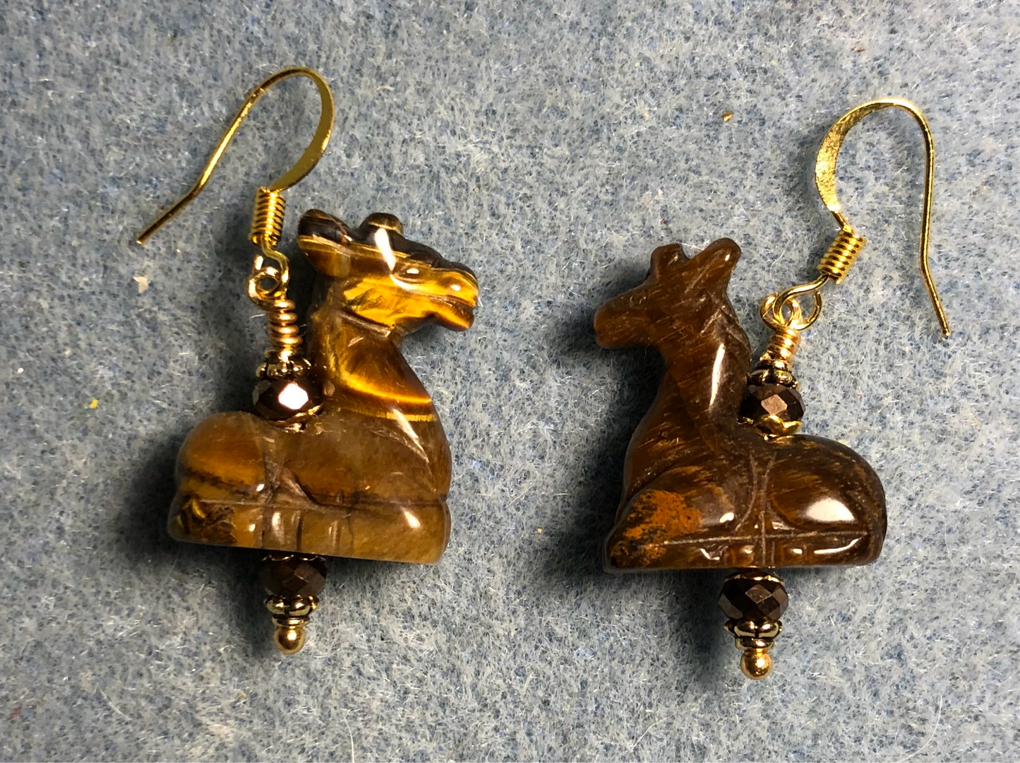 Brown tigereye gemstone camel bead earrings adorned with brown Chinese crystal beads.
