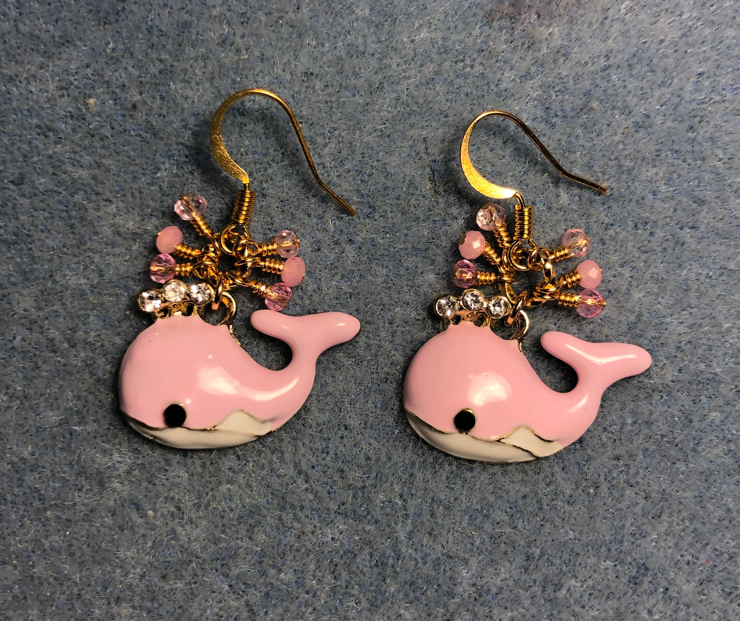 Pink and white enamel and rhinestone whale charm earrings adorned with tiny dangling pink Chinese crystal beads.