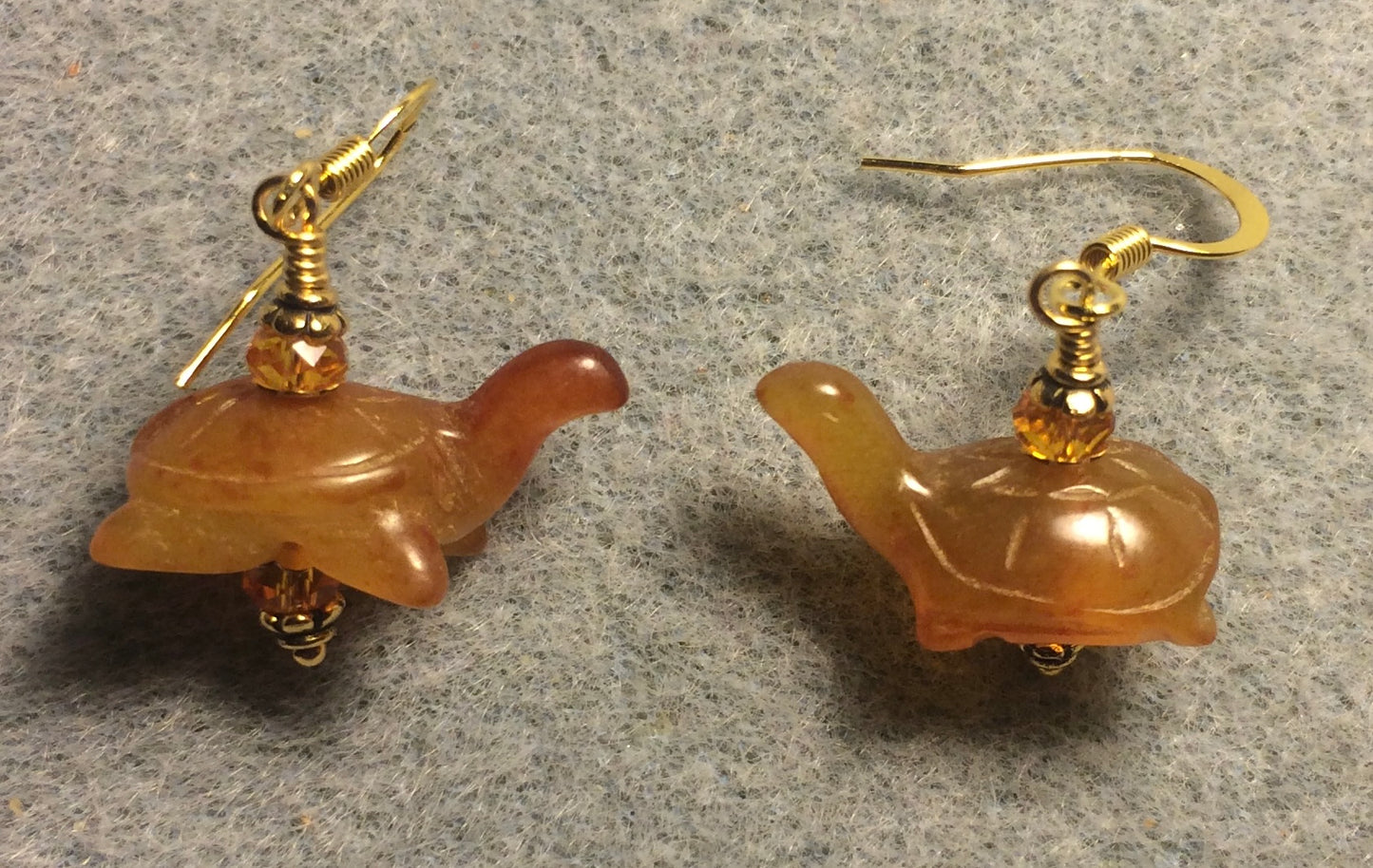 Small genuine vintage carnelian gemstone turtle bead earrings adorned with tangerine Chinese crystal beads.