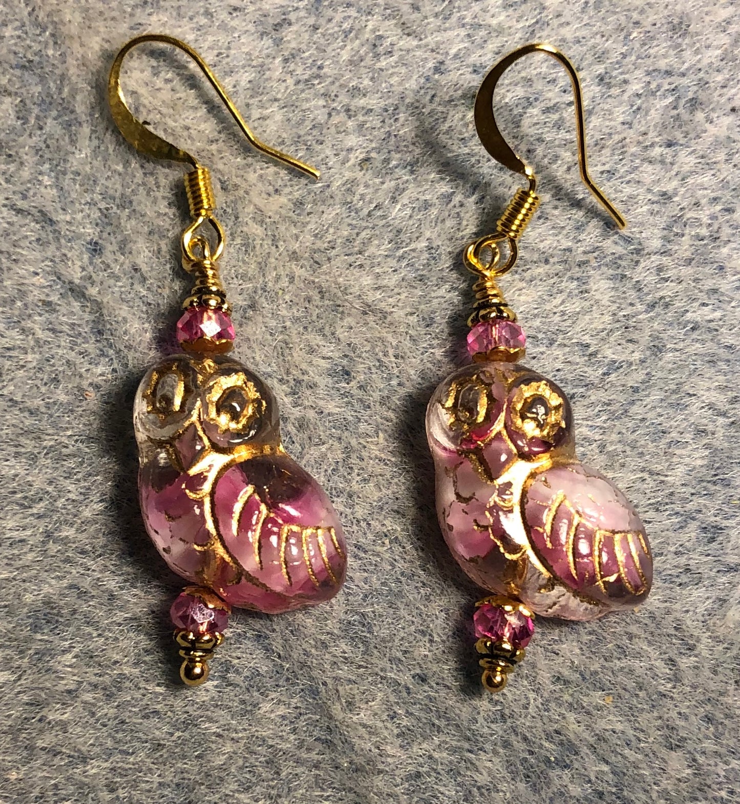 Pink and clear (with gold wash) fancy Czech glass owl bead earrings adorned with hot pink Chinese crystal beads.