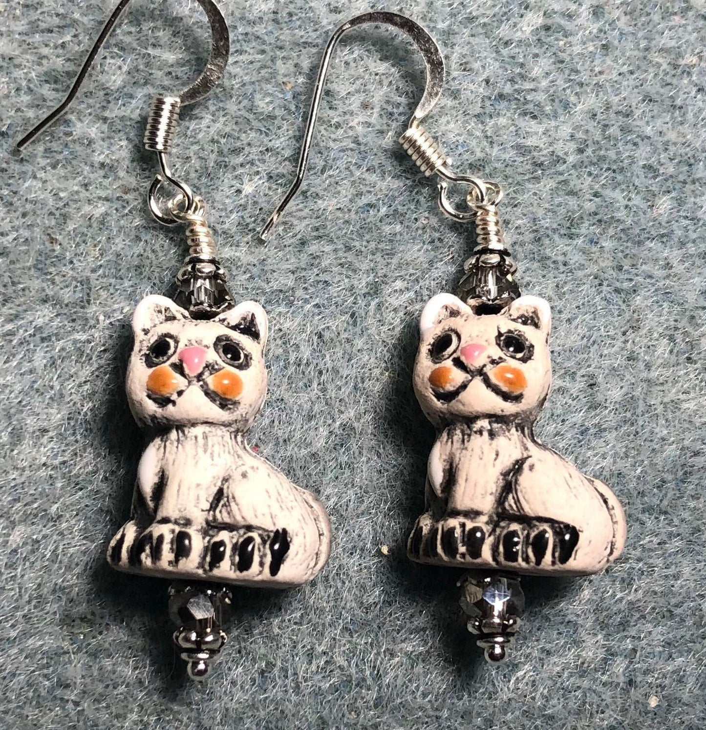 Small grey ceramic cat bead earrings adorned with clear Chinese crystal beads.