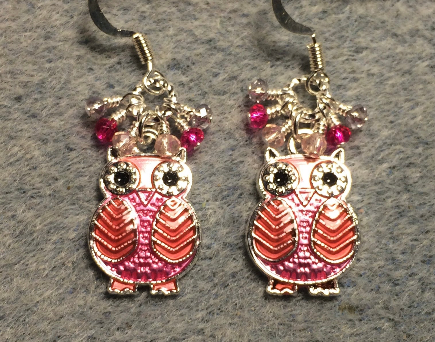Hot pink and light pink enamel owl charm earrings adorned with tiny dangling hot pink and light pink Chinese crystal beads.