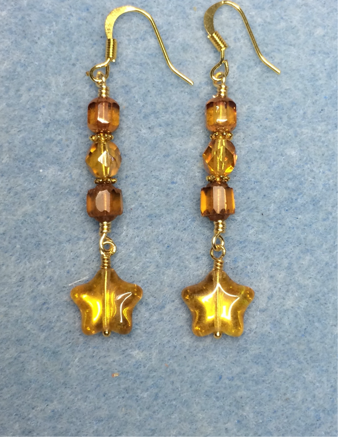Small amber topaz Czech glass star bead earrings adorned with amber Czech glass beads.