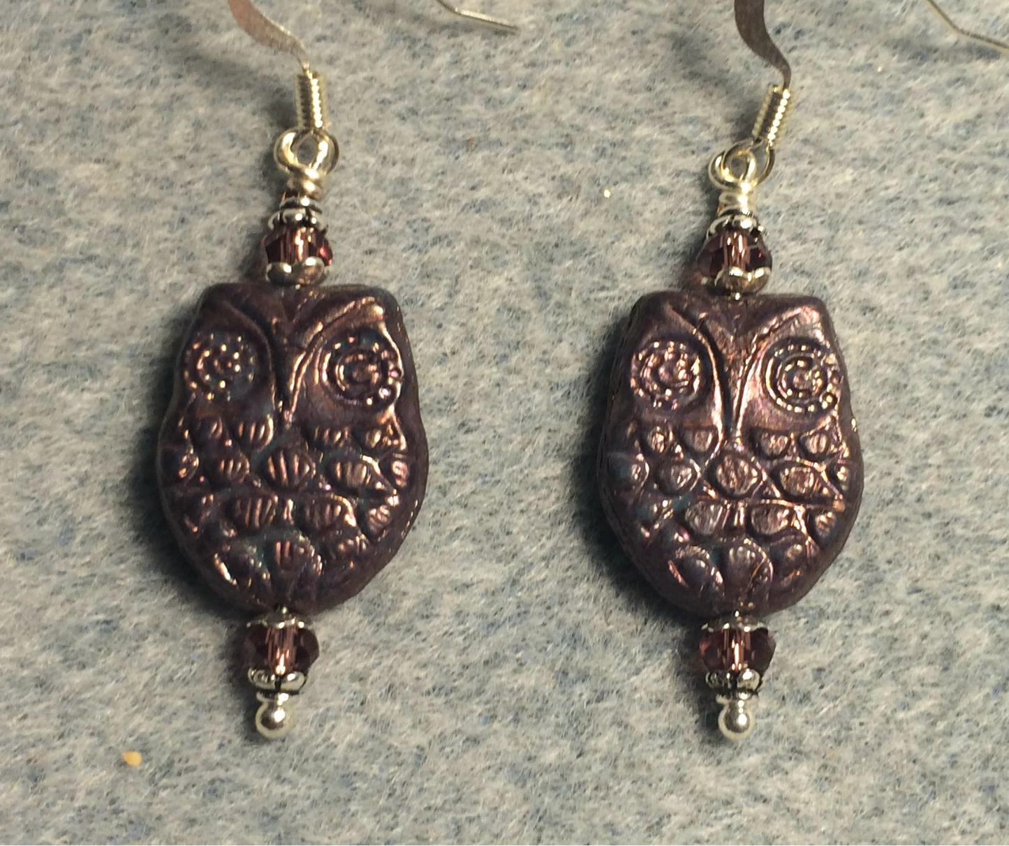 Purple bronze Czech glass owl bead earrings adorned with purple Chinese crystal beads.