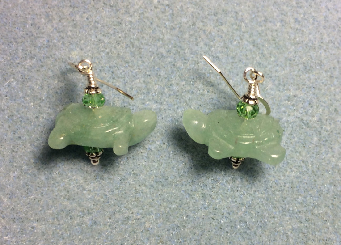 Green aventurine gemstone turtle bead earrings adorned with green Chinese crystal beads.