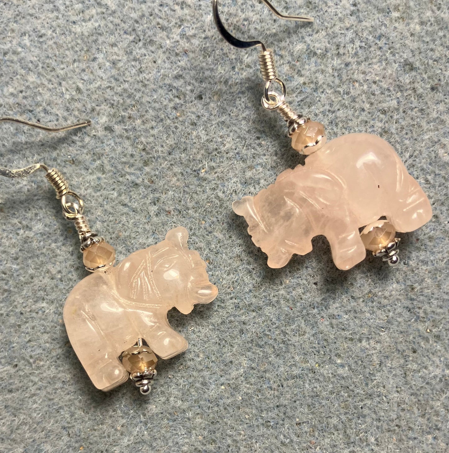 Pink rose quartz gemstone elephant bead earrings adorned with peach Chinese crystal beads.