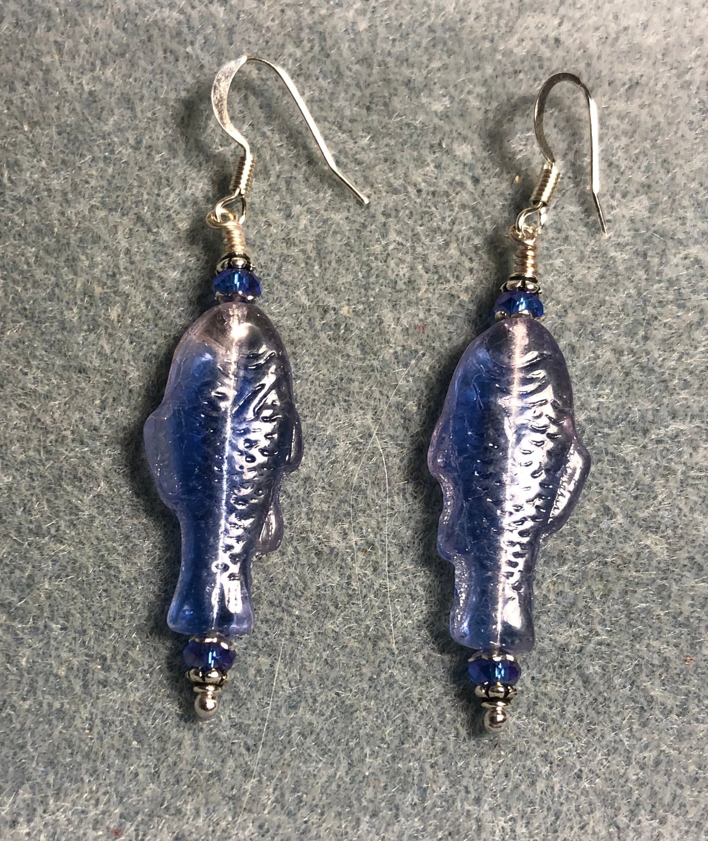Blue and pink Czech glass fish bead earrings adorned with light blue Chinese crystal beads.