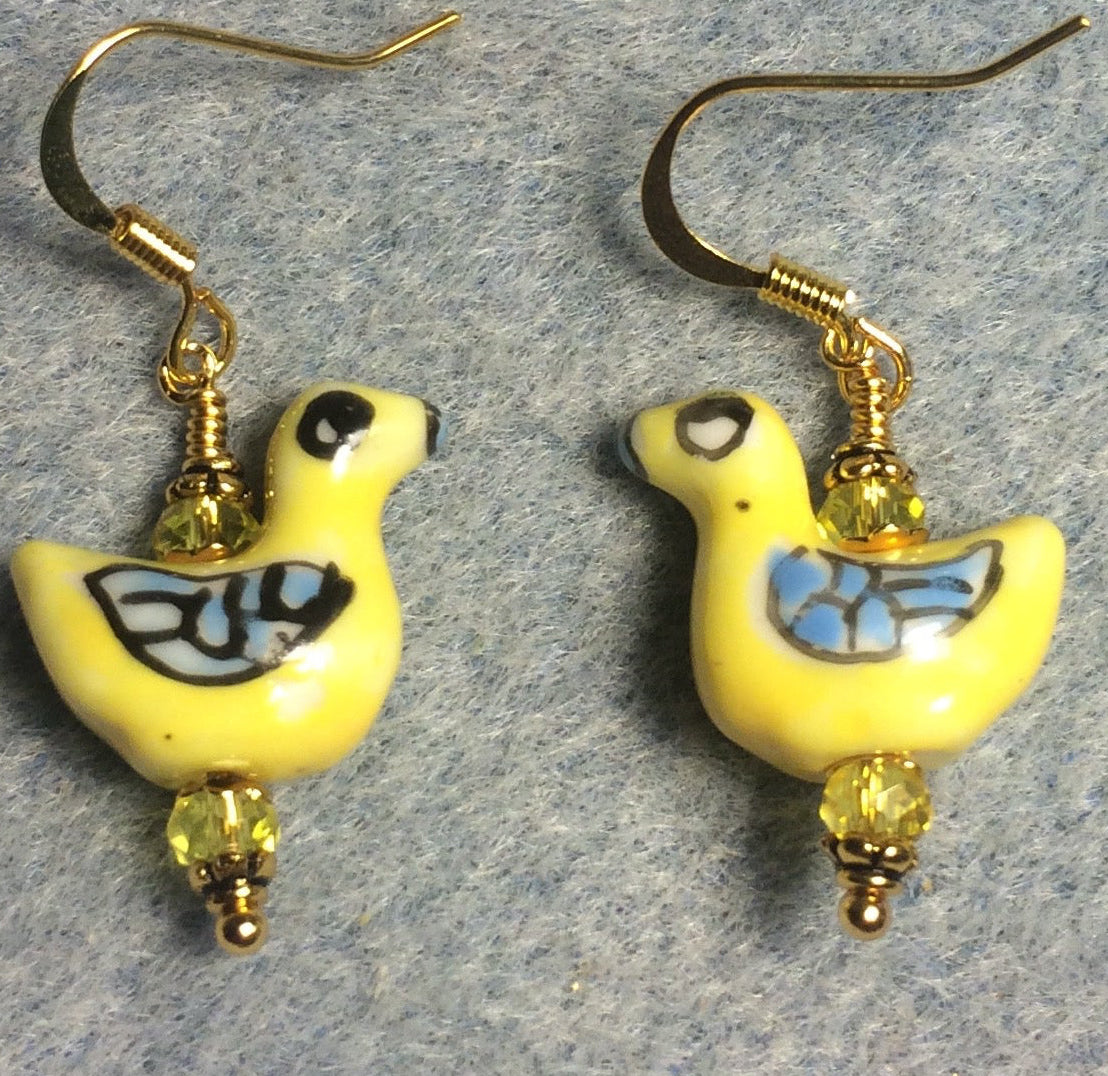Small yellow and blue ceramic geese bead earrings adorned with yellow Chinese crystal beads.