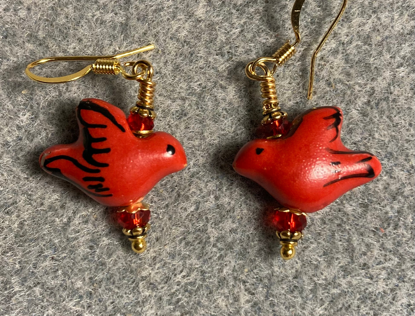Red ceramic dove bead earrings adorned with red Chinese crystal beads.