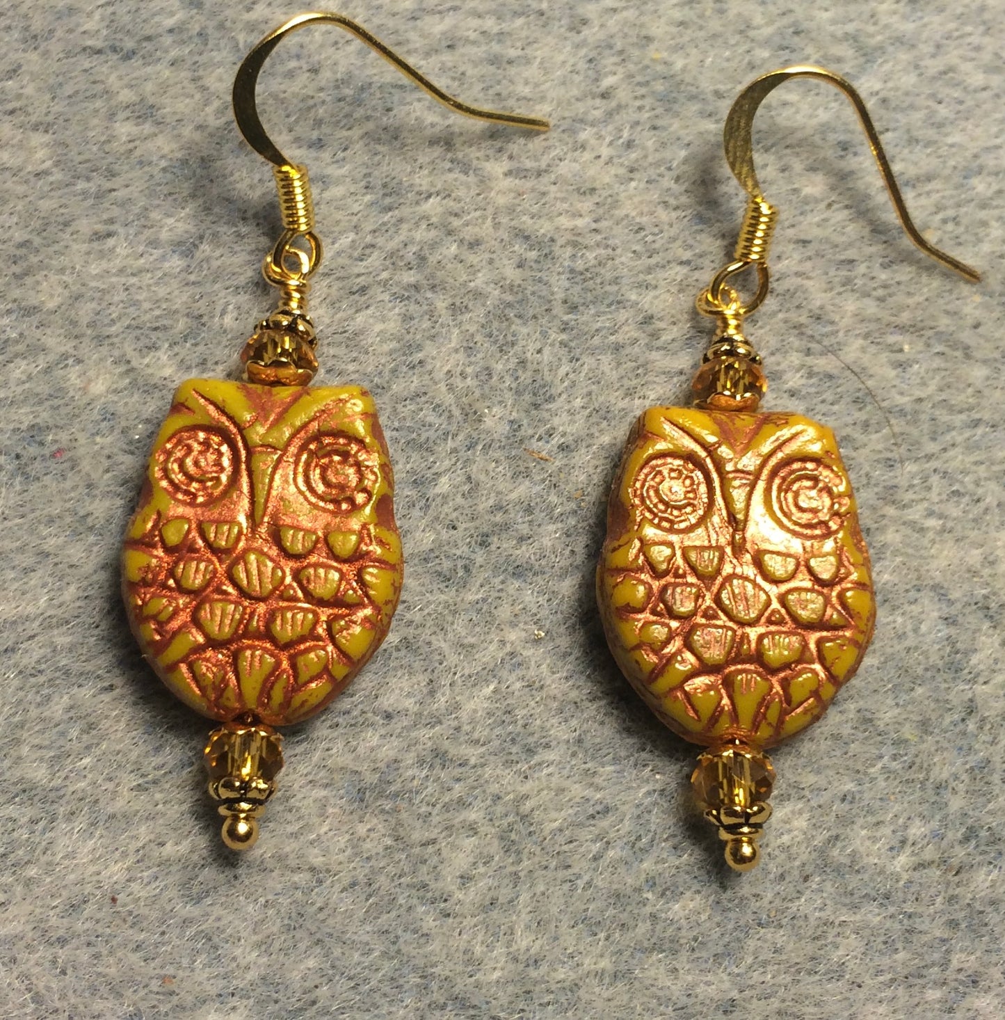 Mustard yellow (with copper wash) Czech glass owl bead earrings adorned with topaz Chinese crystal beads.