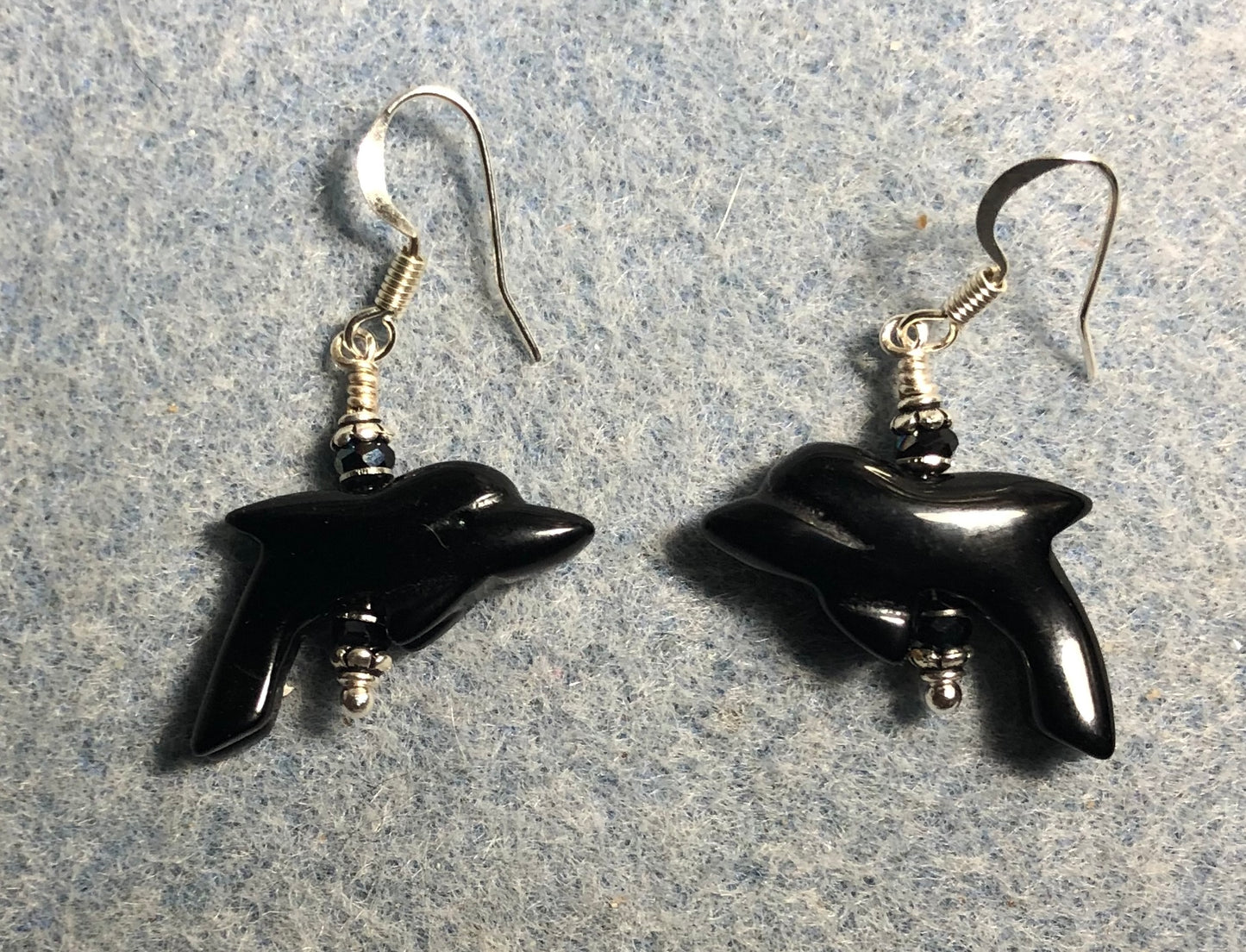 Black onyx gemstone dolphin bead earrings adorned with black Chinese crystal beads.